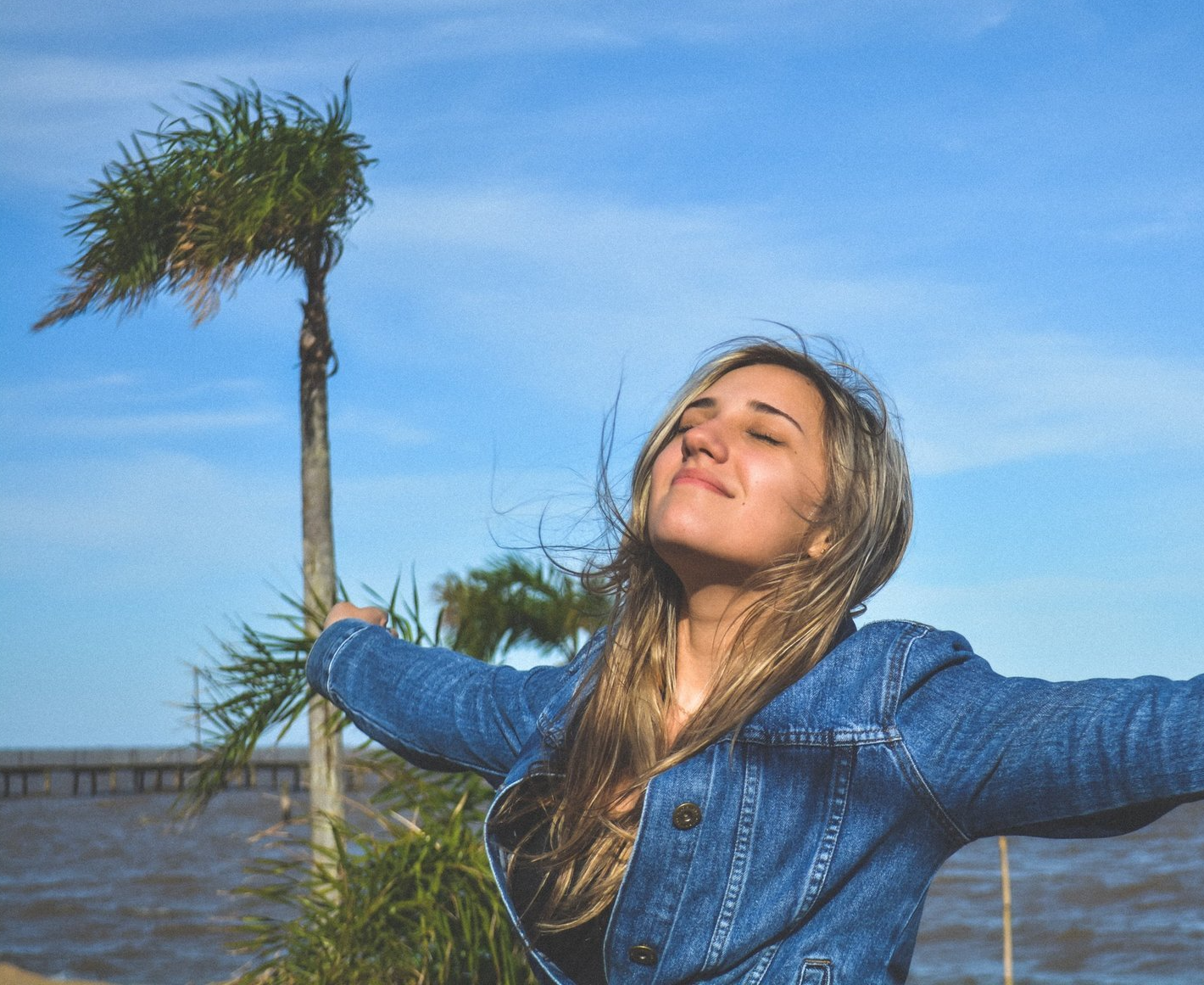woman breathing fresh air