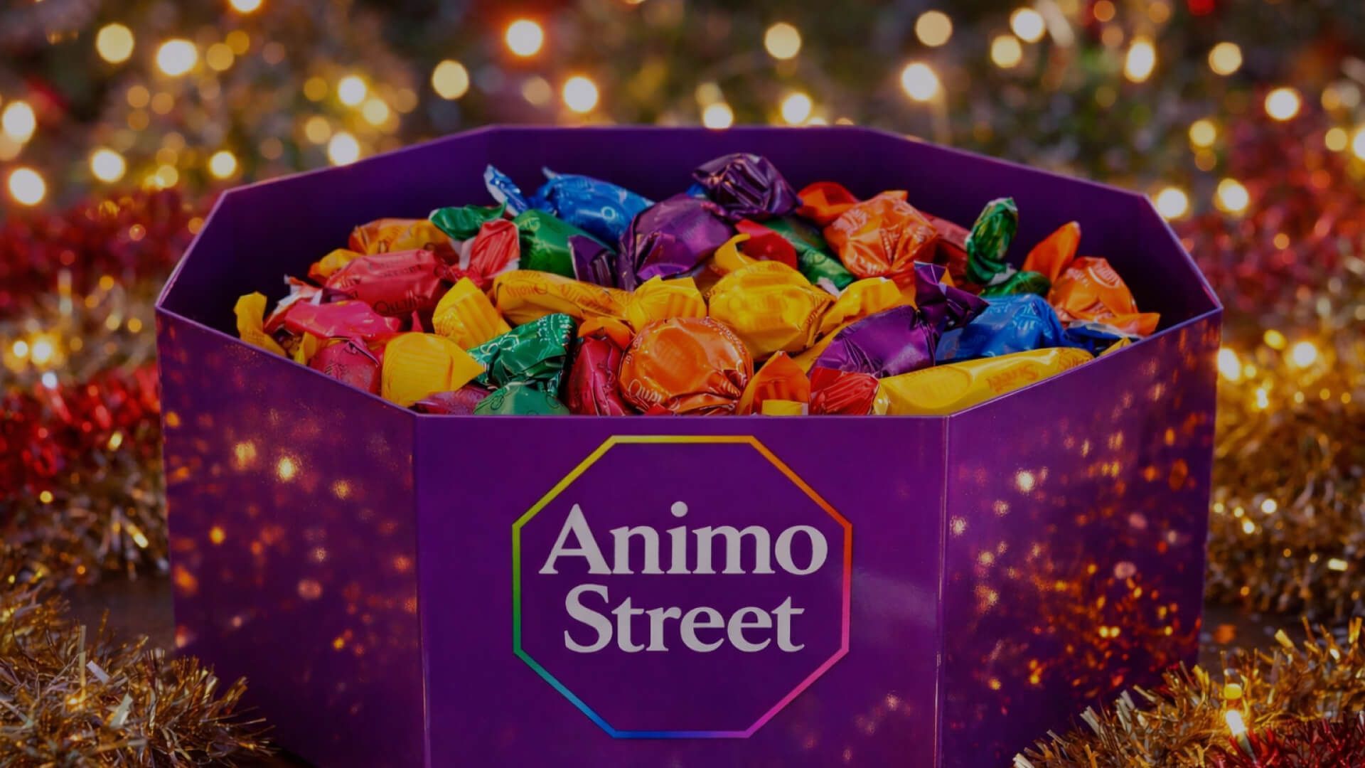 Purple box of colorful wrapped candies with