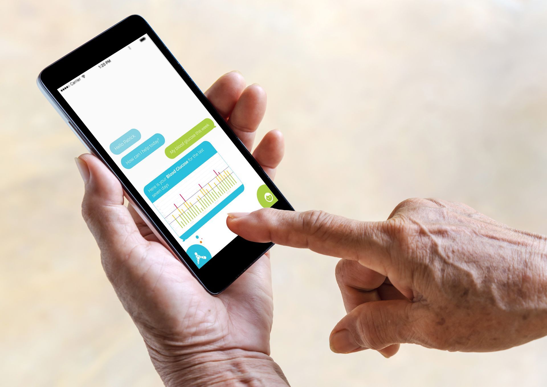 a person is holding a cell phone in their hand and pointing at it .