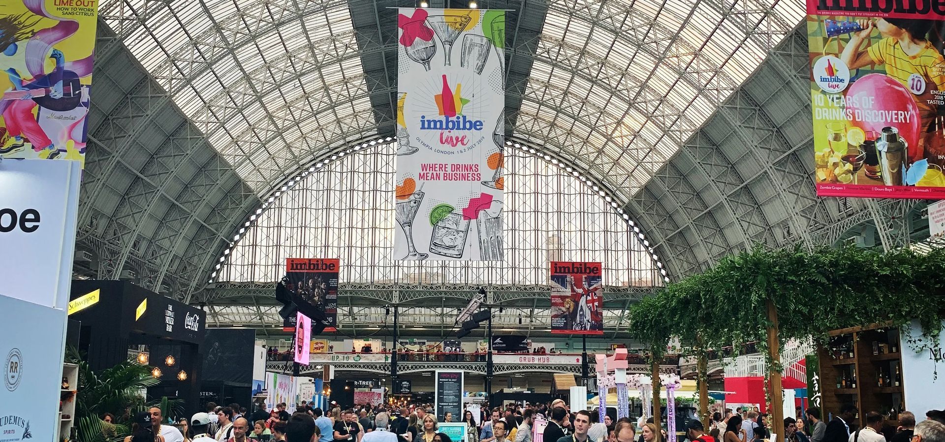 a large crowd of people gathered in London Olympia for the Imbibe exhibition.