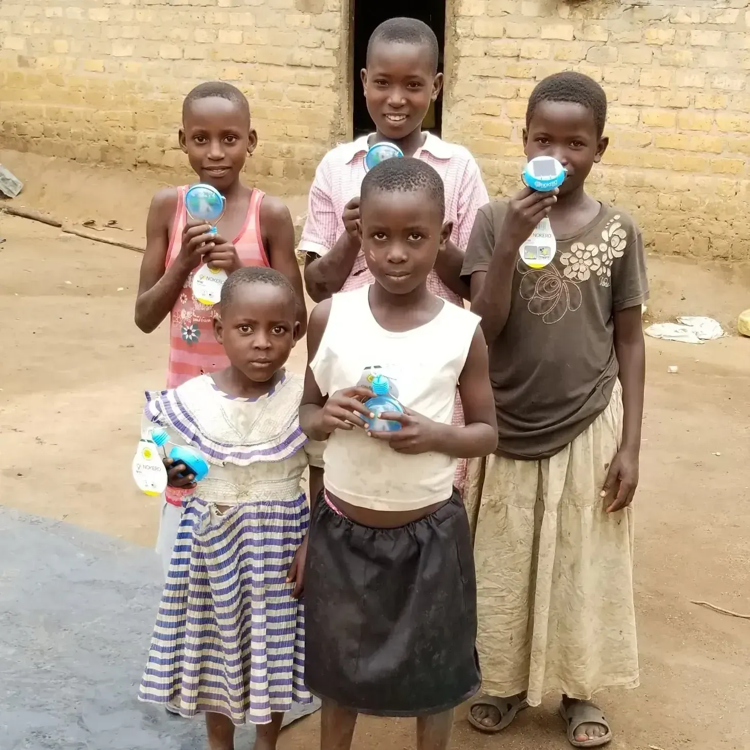 a group of children holding toys