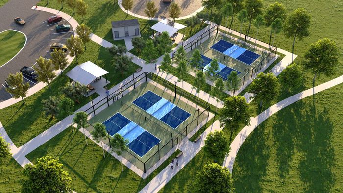 A blue tennis court with a white net