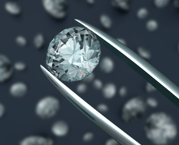 Diamond held by tweezers against a blurred gemstone background