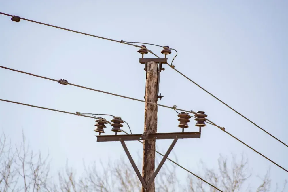 Wooden Utility Pole With Power Lines — KACE Electrical Solutions In Ramsay, QLD
