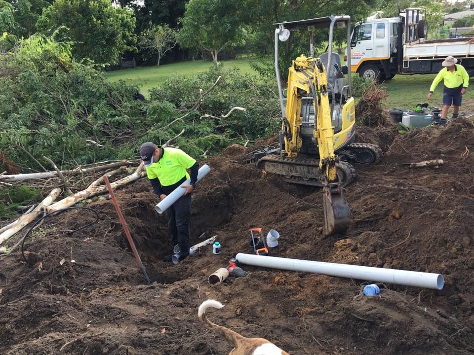 Men Working on the Pipes — Simpson's Plumbing & Maintenance Service in Dakabin, QLD