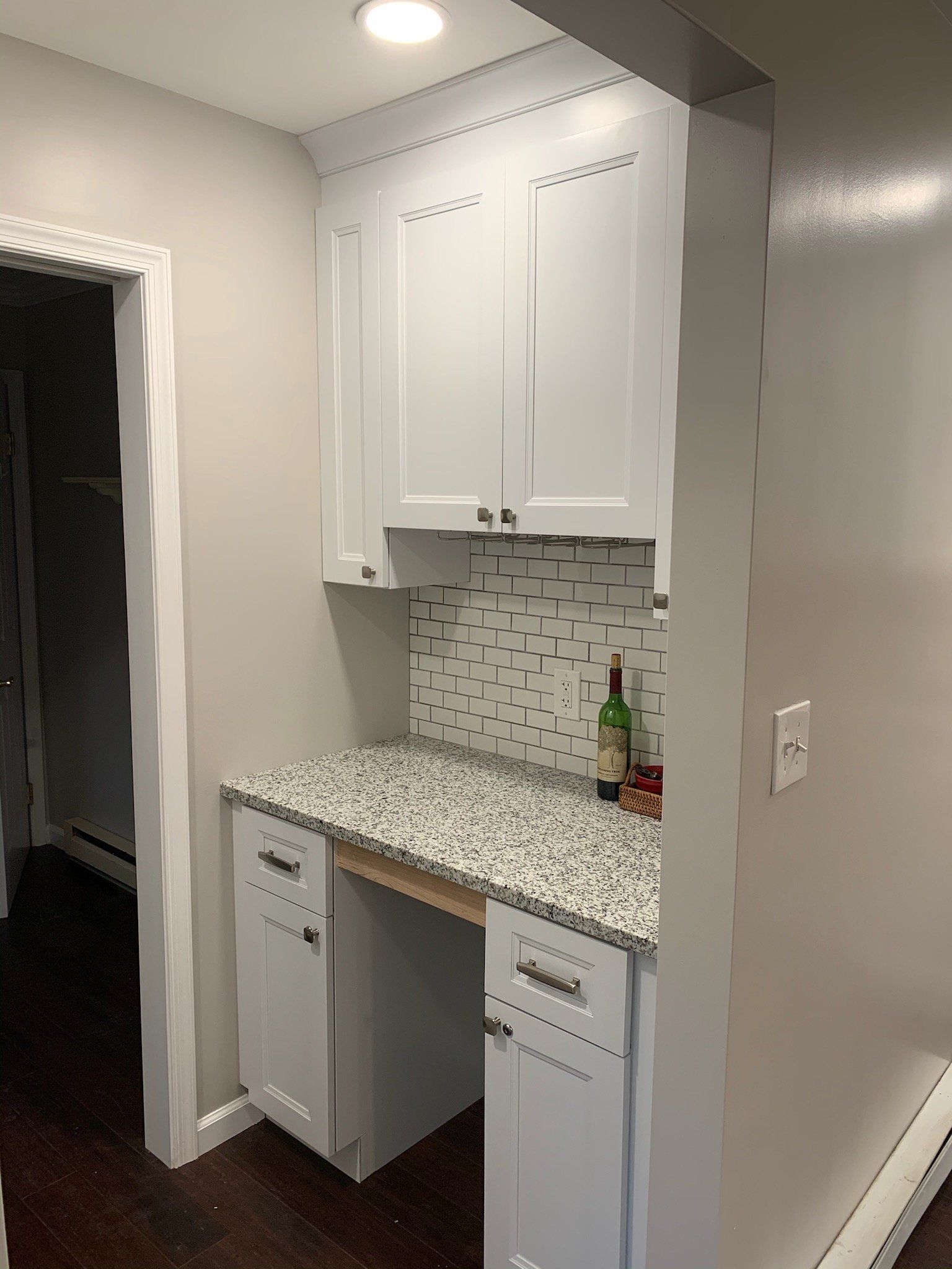 Small kitchen renovation with open shelving and modern finishes