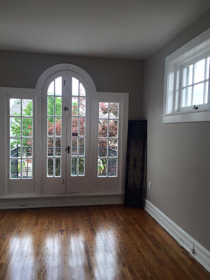 Modern in-law suite addition with private entrance and sitting area
