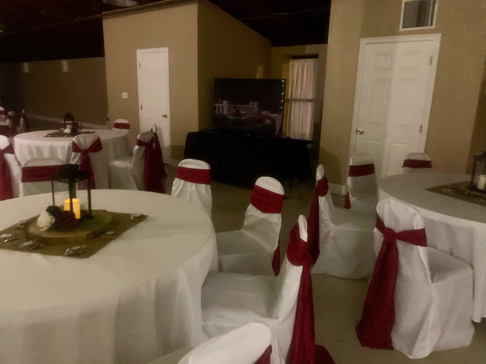 Reception Area with Round Tables Showing Video Set Up Option