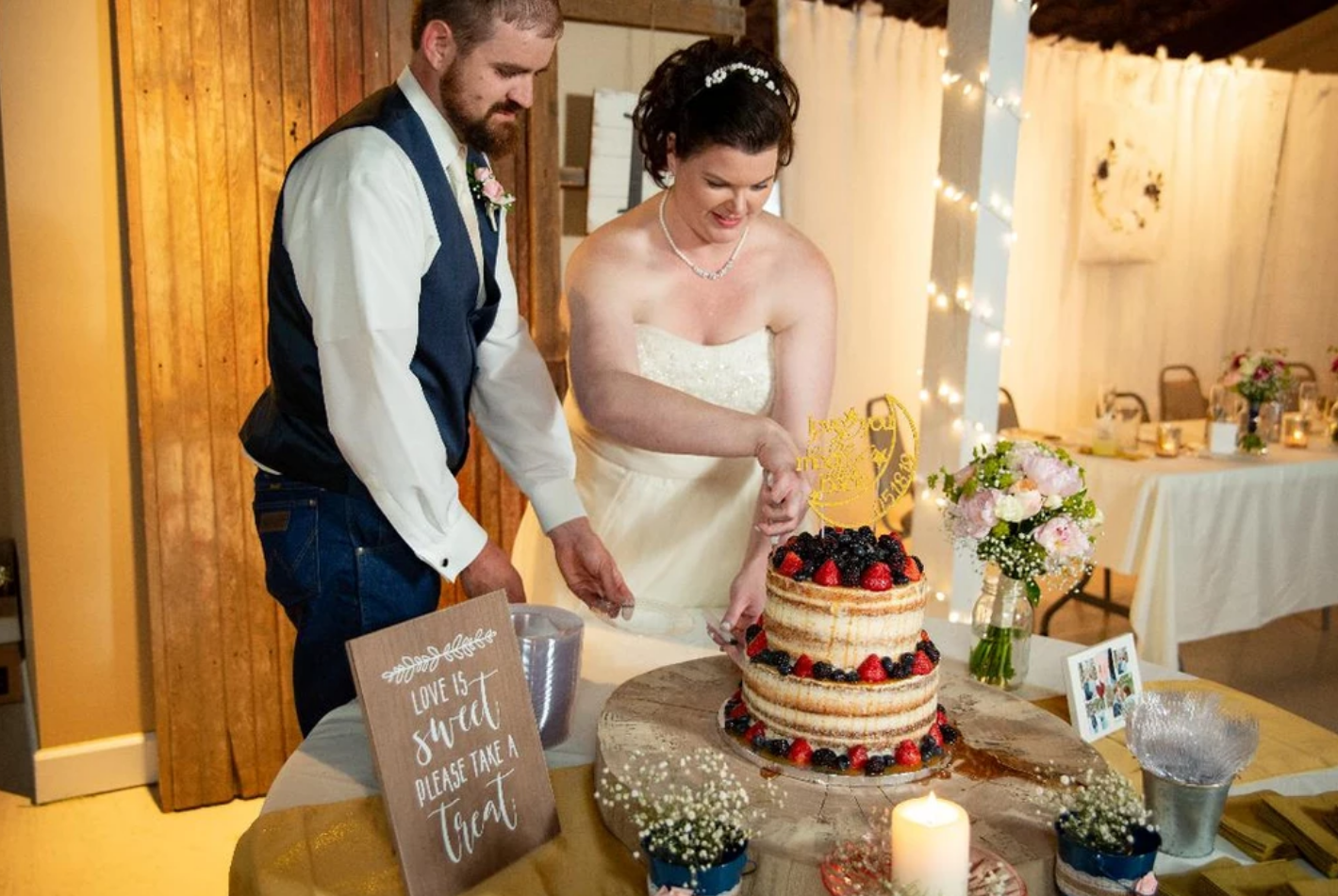 Bride and Groom Cutting Cake