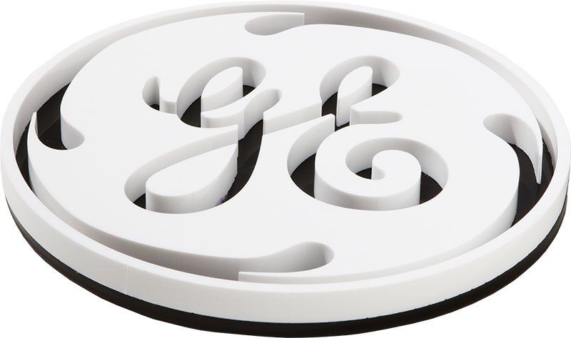 Flat cut plastic logo with a black backer.