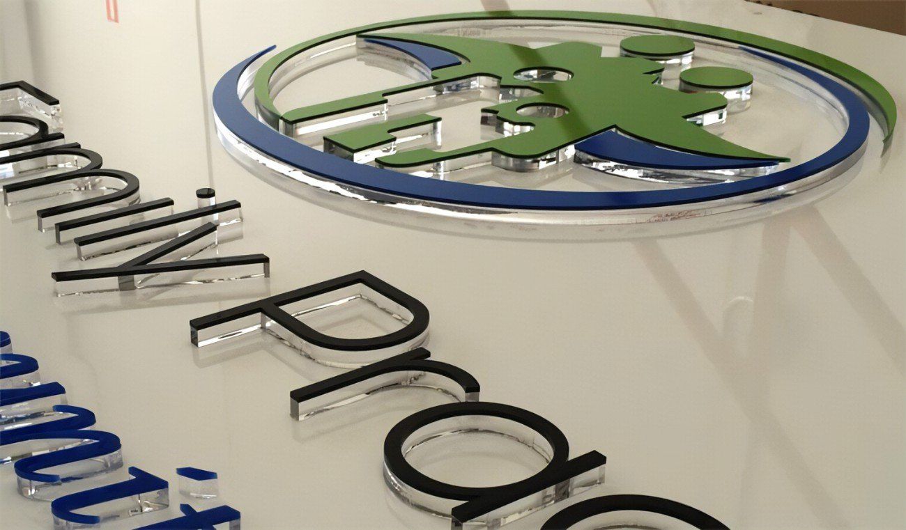 Layered flat cut plastic letters.