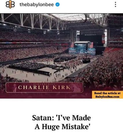 Crowded stadium event stage with Charlie Kirk banner and article headline reading “Satan: I’ve Made A Huge Mistake”