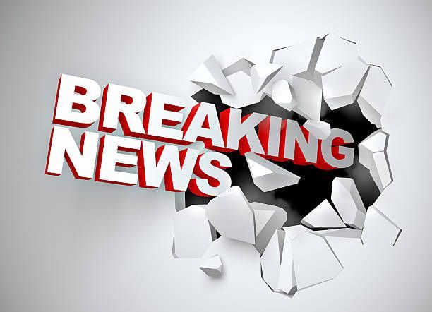 Red “BREAKING NEWS” text bursting through a cracked white wall