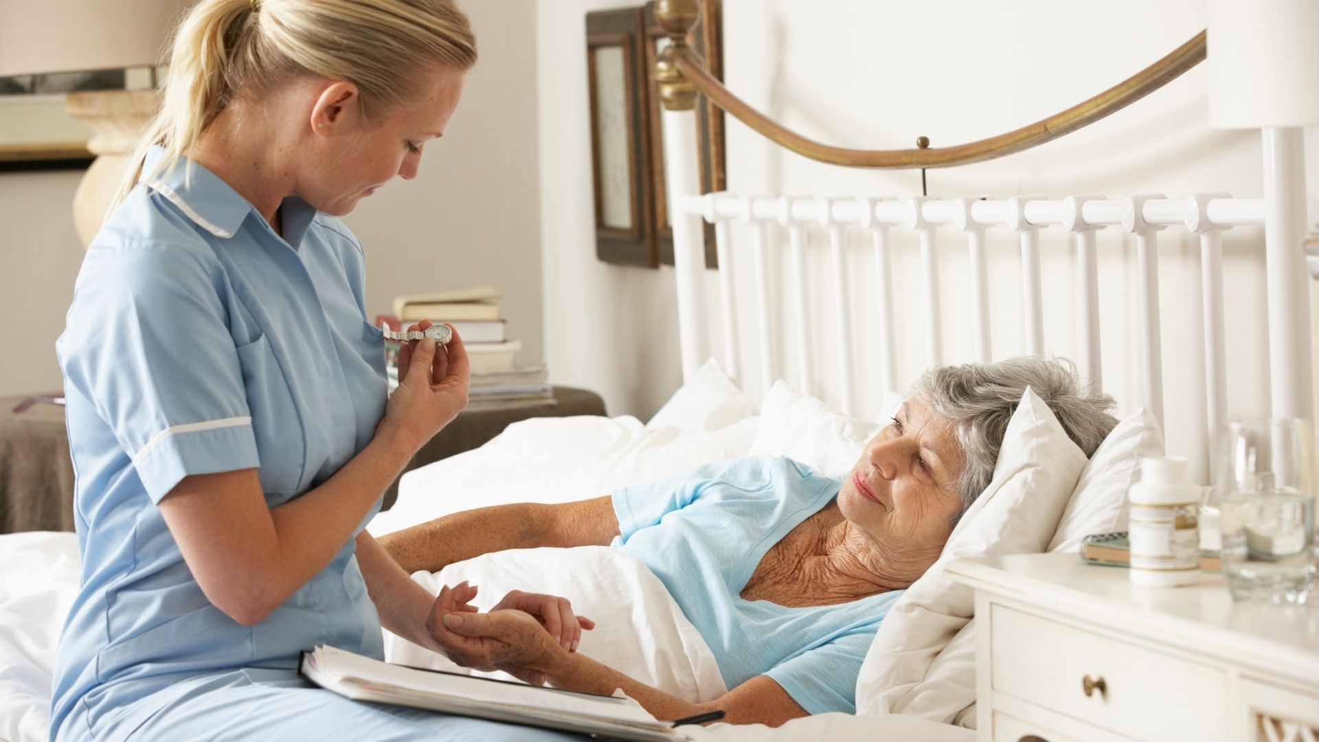 A home health nurse and her patient.