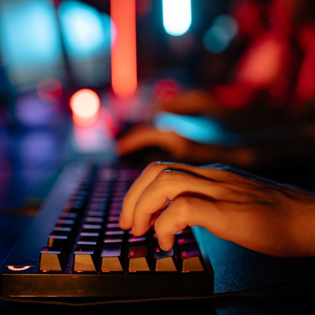 A person typing on a computer.