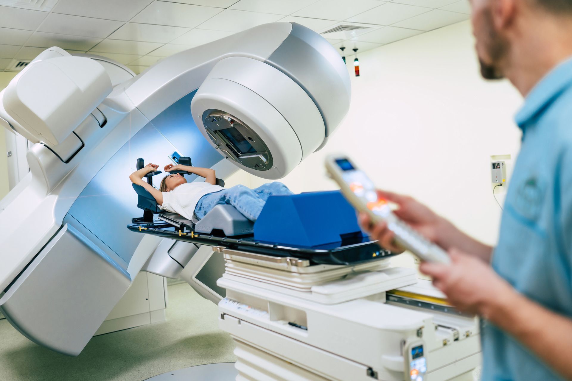 A woman is undergoing radiation therapy for cancer.