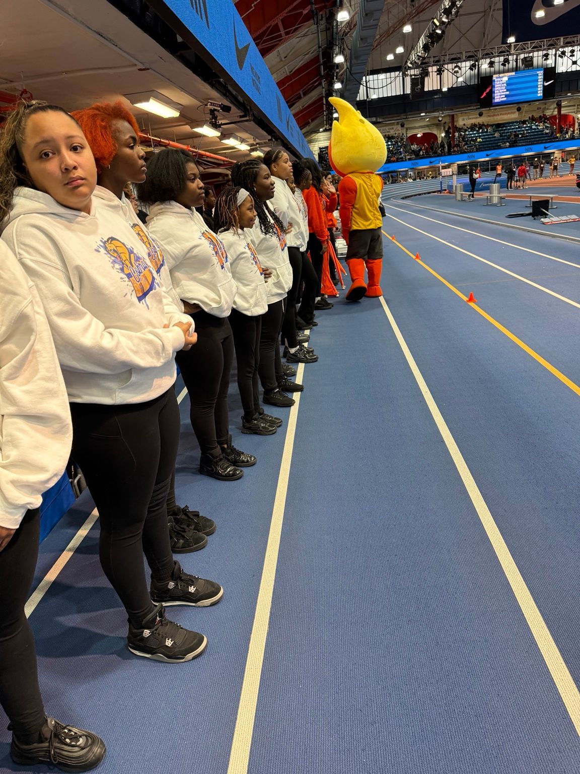 Cobra students preparing to perform at the Armory track and field venue