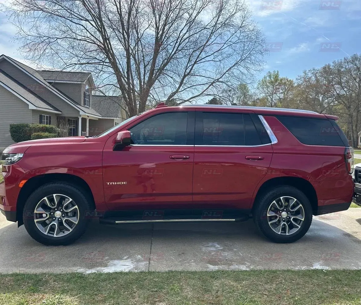 Shiny red exterior of a car after ceramic coating service by Northern Lights Auto Detailing, emphasizing UV and oxidation protection