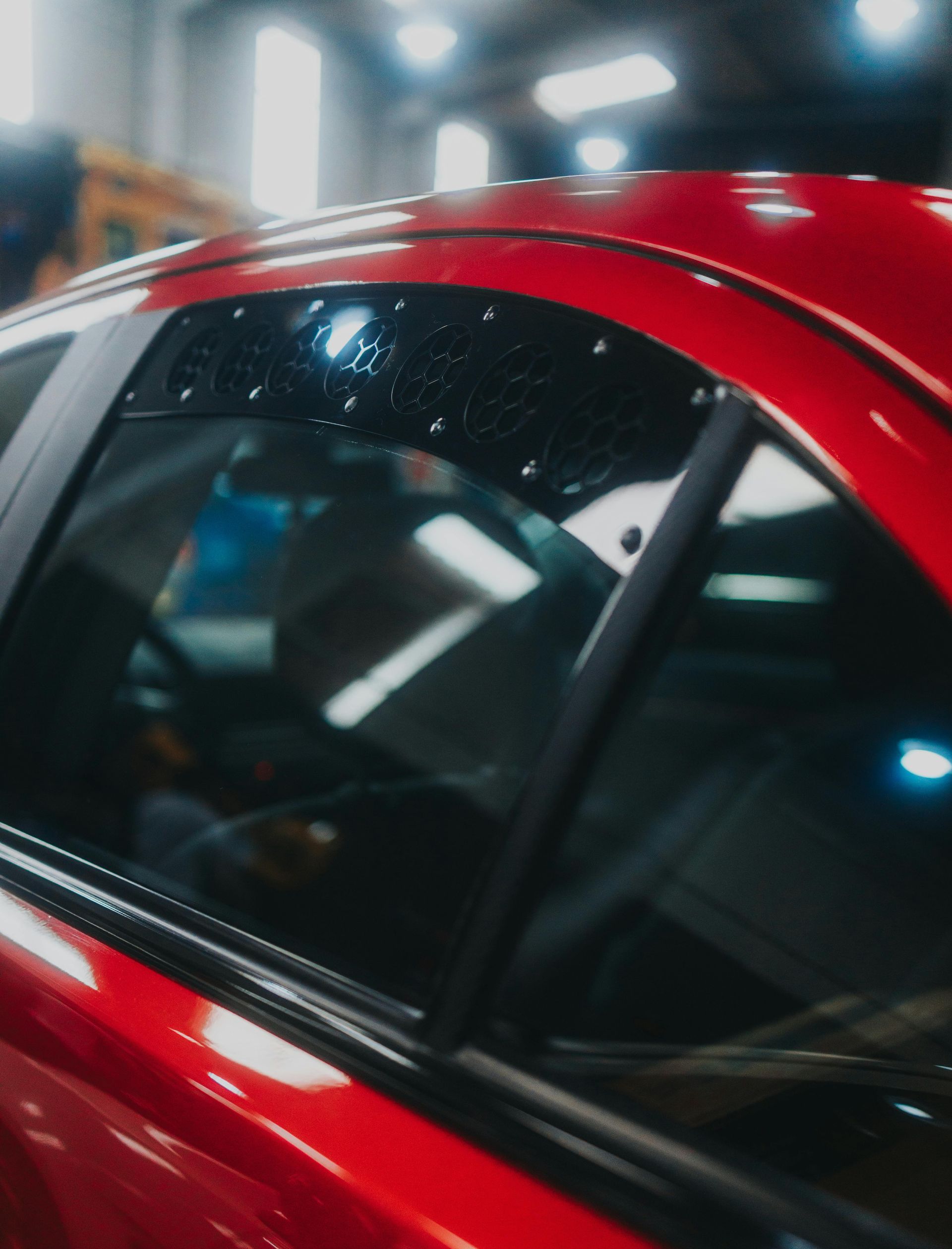 Professional vs DIY window tint comparison on a vehicle, with the professional tint applied by Northern Lights Home & Auto Coatings