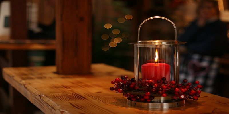 Memorial candle display representing compassionate Savage, MN cremations services in a peaceful setting