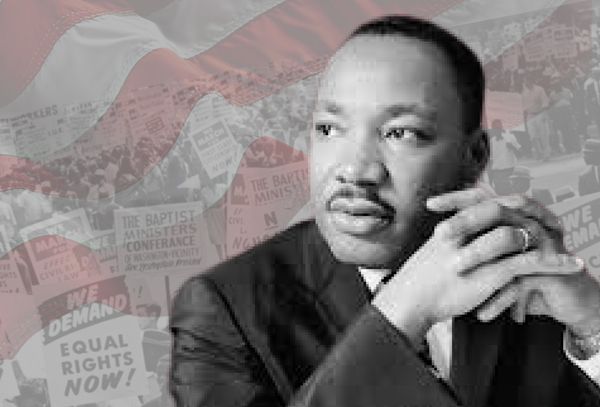 Martin Luther King Jr. in a suit, hands clasped, with civil rights protest signs in the background