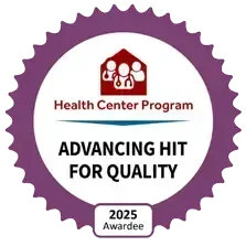 Purple award badge for Health Center Program, reading “Advancing HIT for Quality” and “2025 Awardee”