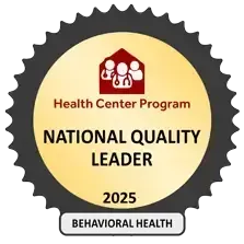 Health Center Program National Quality Leader 2025 Behavioral Health badge with black gear border and gold center