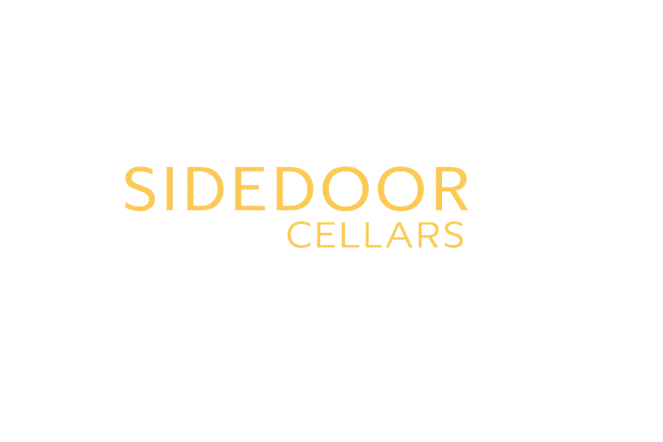 Sidedoor Cellars logo in gold text on a white background