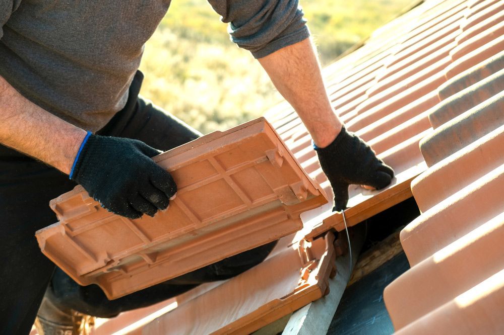 Roofer Placing Tiles — Goonellabah Roof Tilers In Monaltrie, NSW