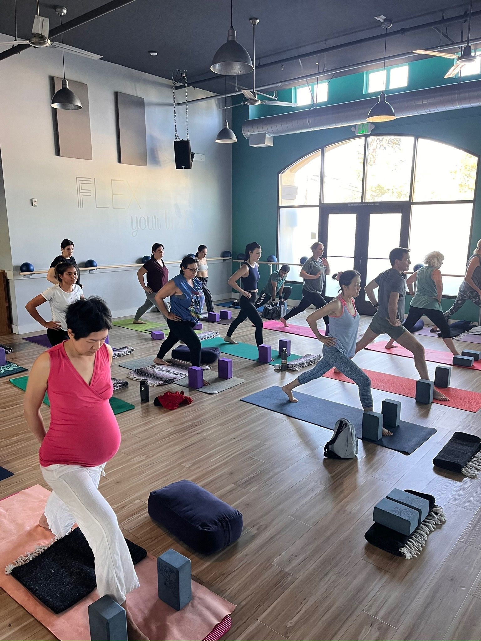 A variety of participants in yoga class r