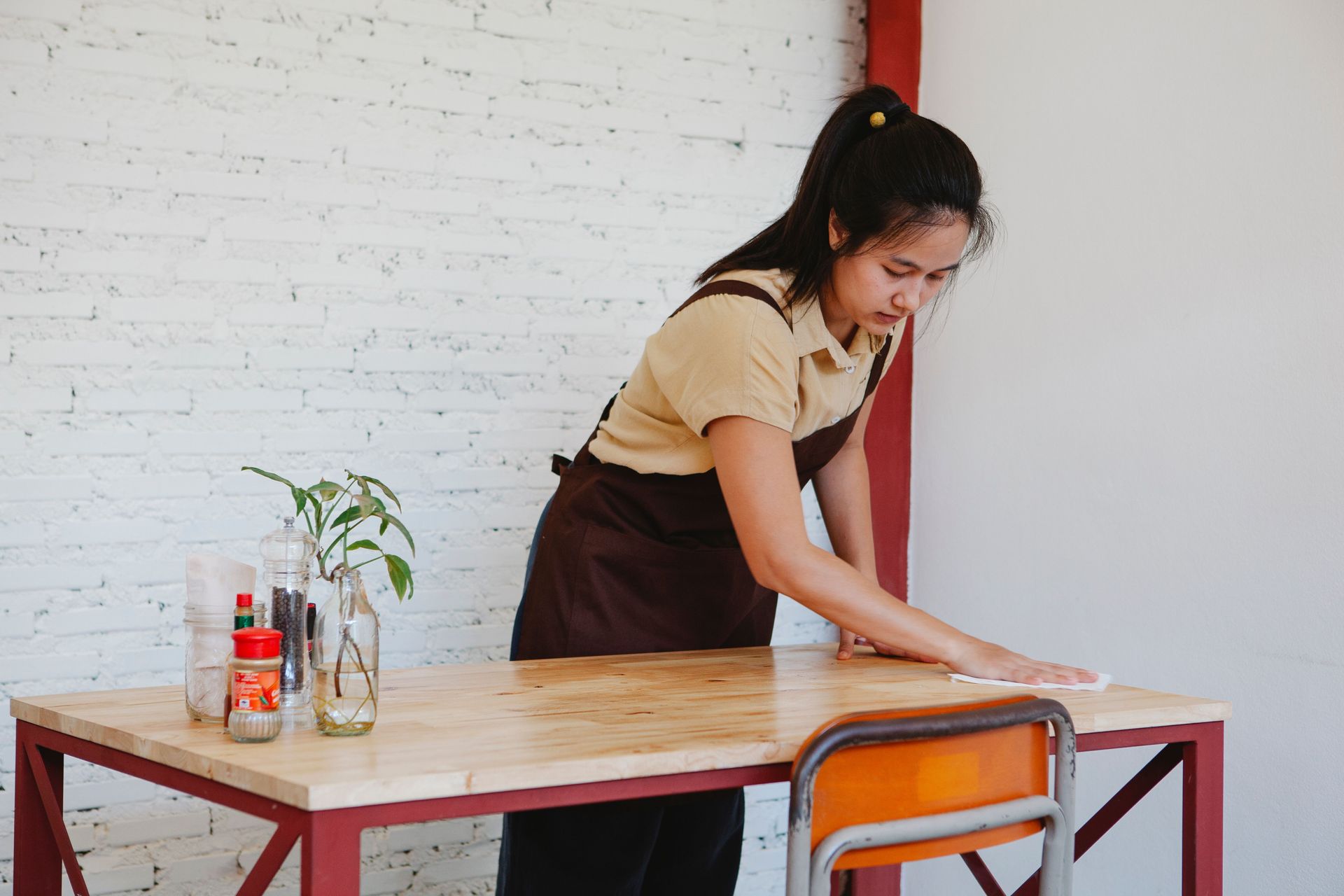 commercial cleaning services technician disinfecting office break room
