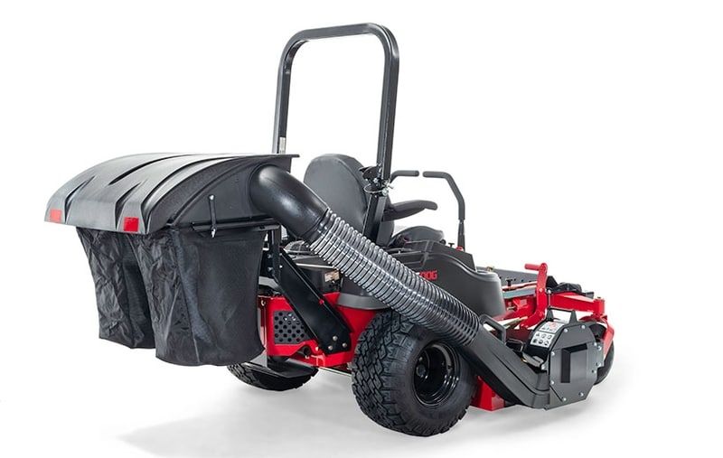 A Big Dog mower with a vacuum attached to it.