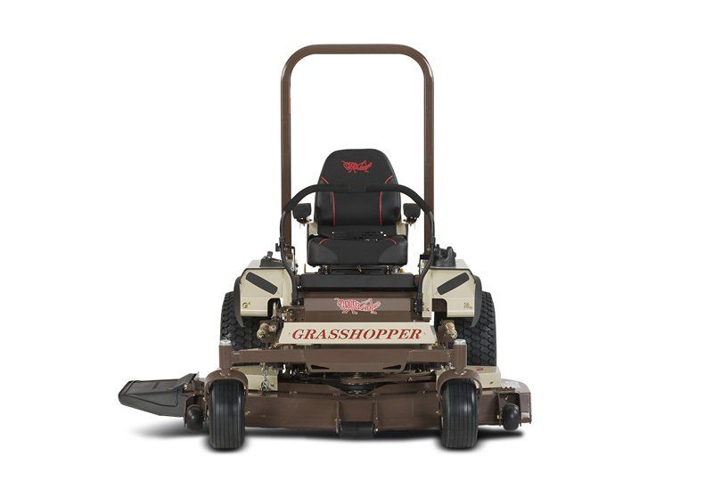 a brown and white grasshopper lawn mower on a white background