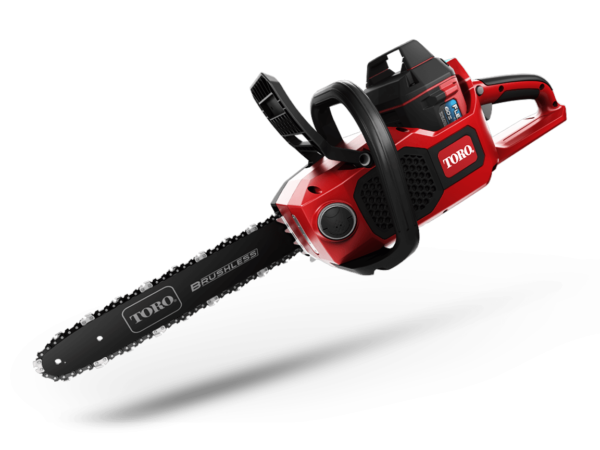 A red toro chainsaw is sitting on a white surface
