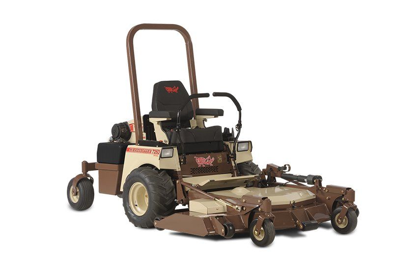 a brown and tan lawn mower 