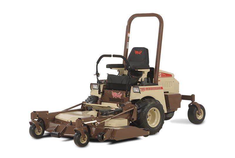 a brown and white lawn mower 