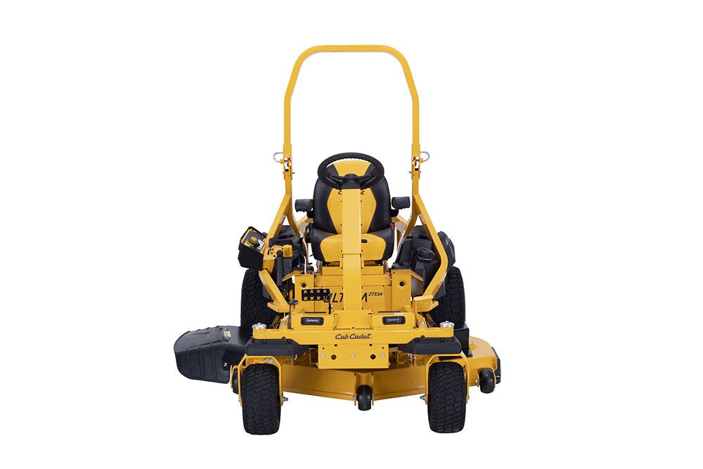 A cub cadet mower is sitting on a white surface.