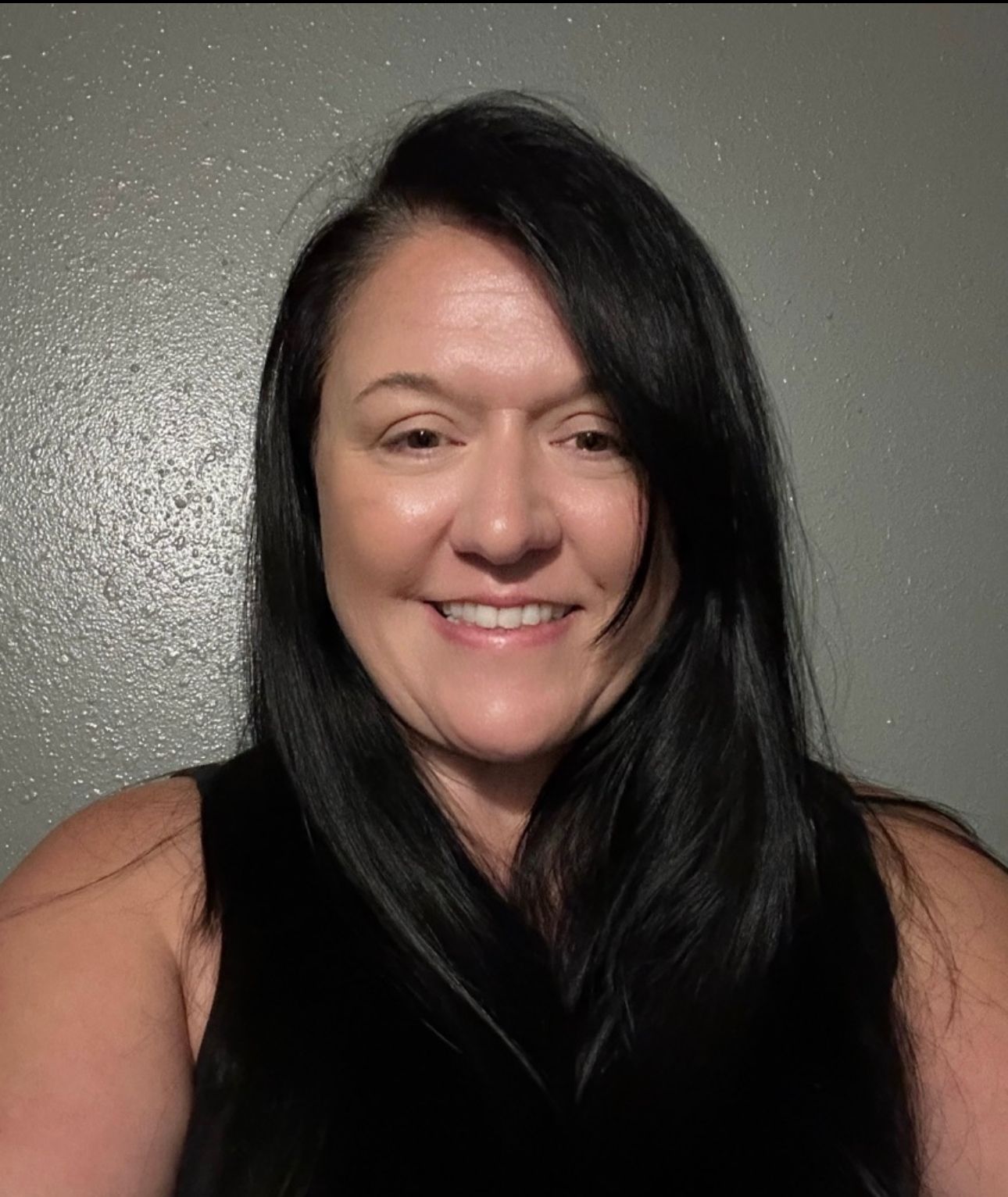 M&D Associate Bridget Hysell is smiling for the camera.