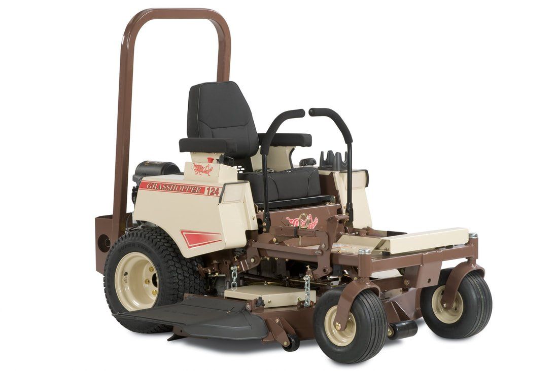 a brown and white grasshopper lawn mower on a white background