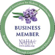 NAHA Business Member seal with purple flowers and green circular border