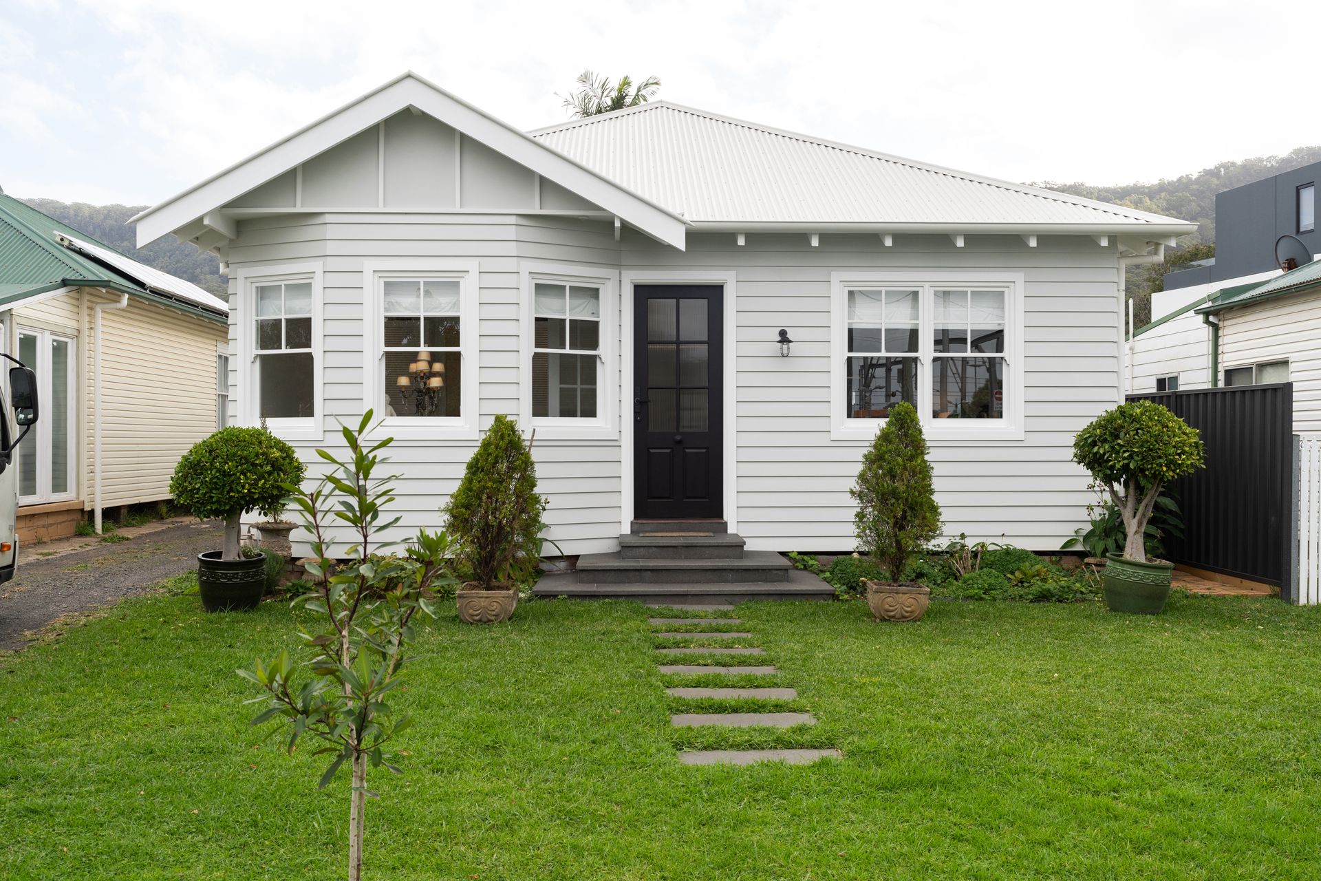 A Home with A Lawn In Front Of it — LG Constructions in Thirroul, NSW