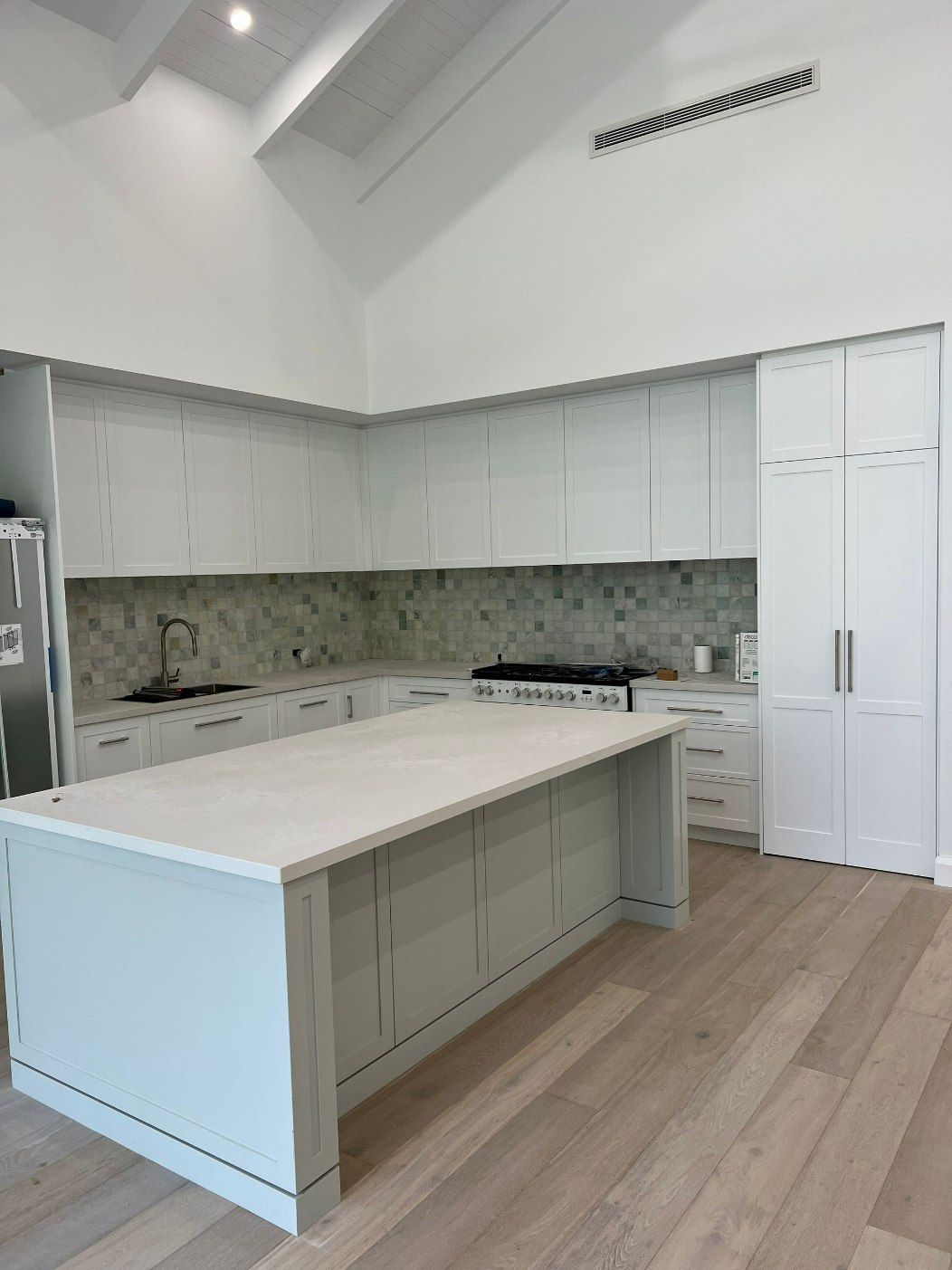 Spacious, Light-blue and White Kitchen — LG Constructions in Thirroul, NSW