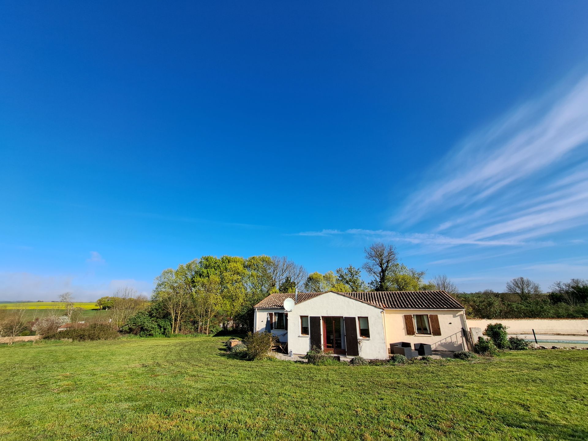 villa in the french countryside surrounded by grass