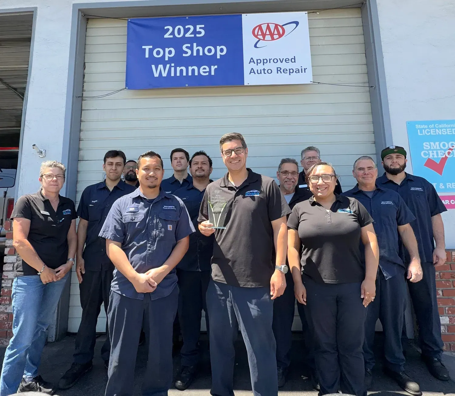 2025 Top Shop by AAA, our expert team in front of sign |  | Spiteri's Complete Auto Service