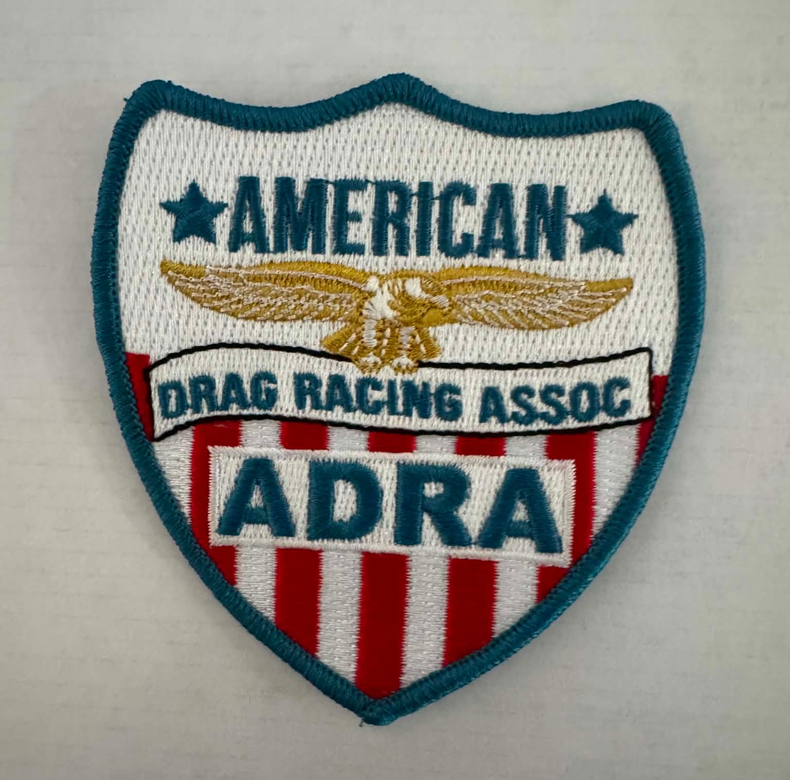 A logo for the american drag racing association