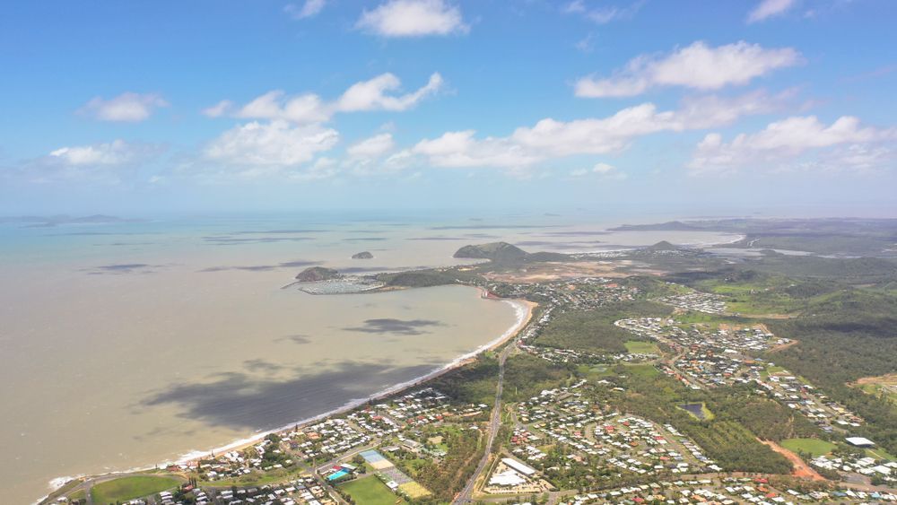 An Aerial View Of A City Next To A Body Of Water — All Hours Vac Truck In Yeppoon, QLD