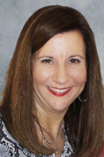 Sandi York - a woman smiling