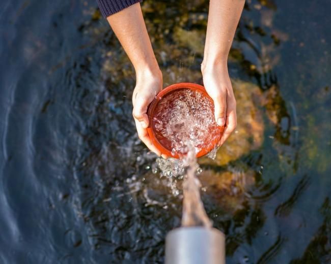 water flowing into a container