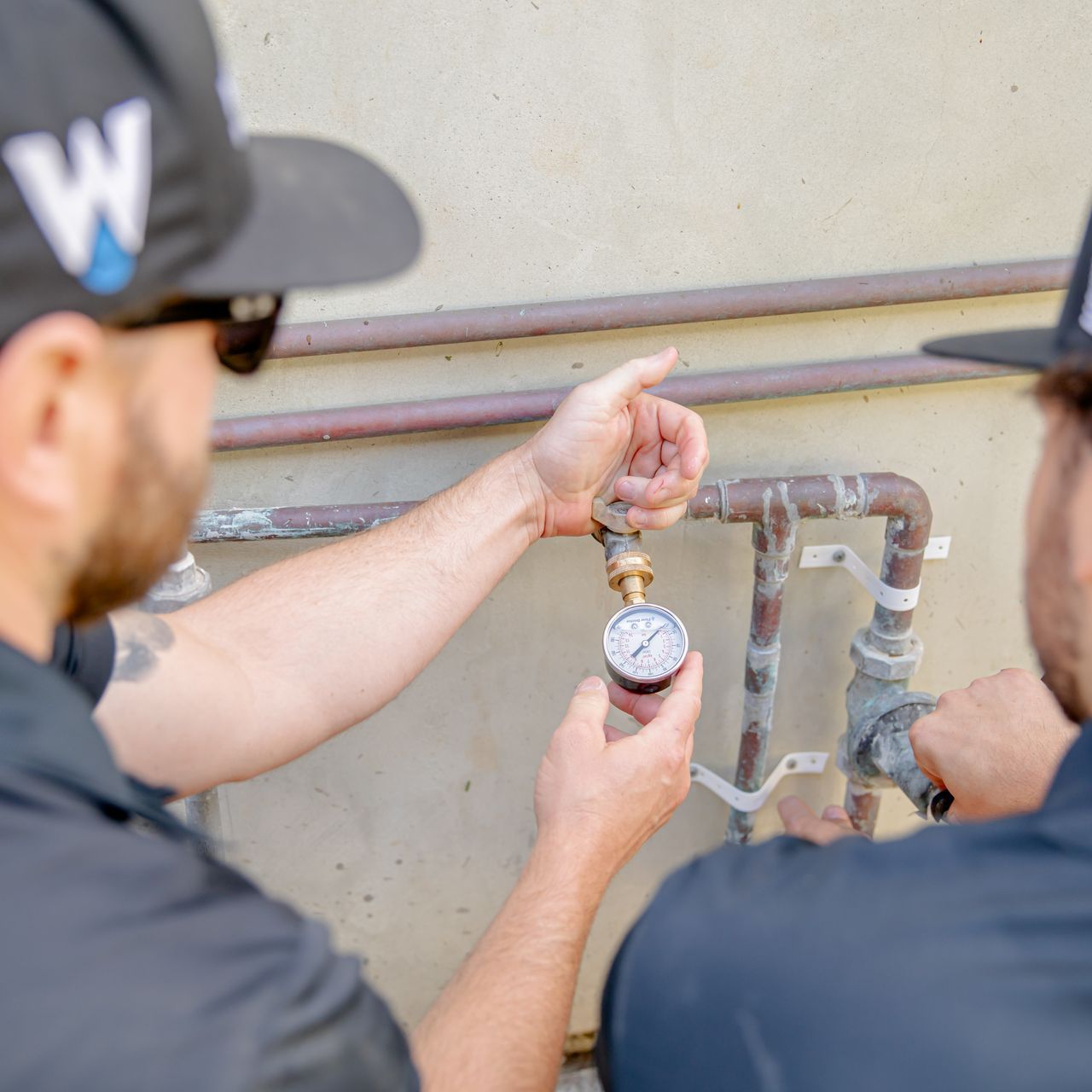 Williams Mechanical Co technician working on a pressure reducing valve in San Diego