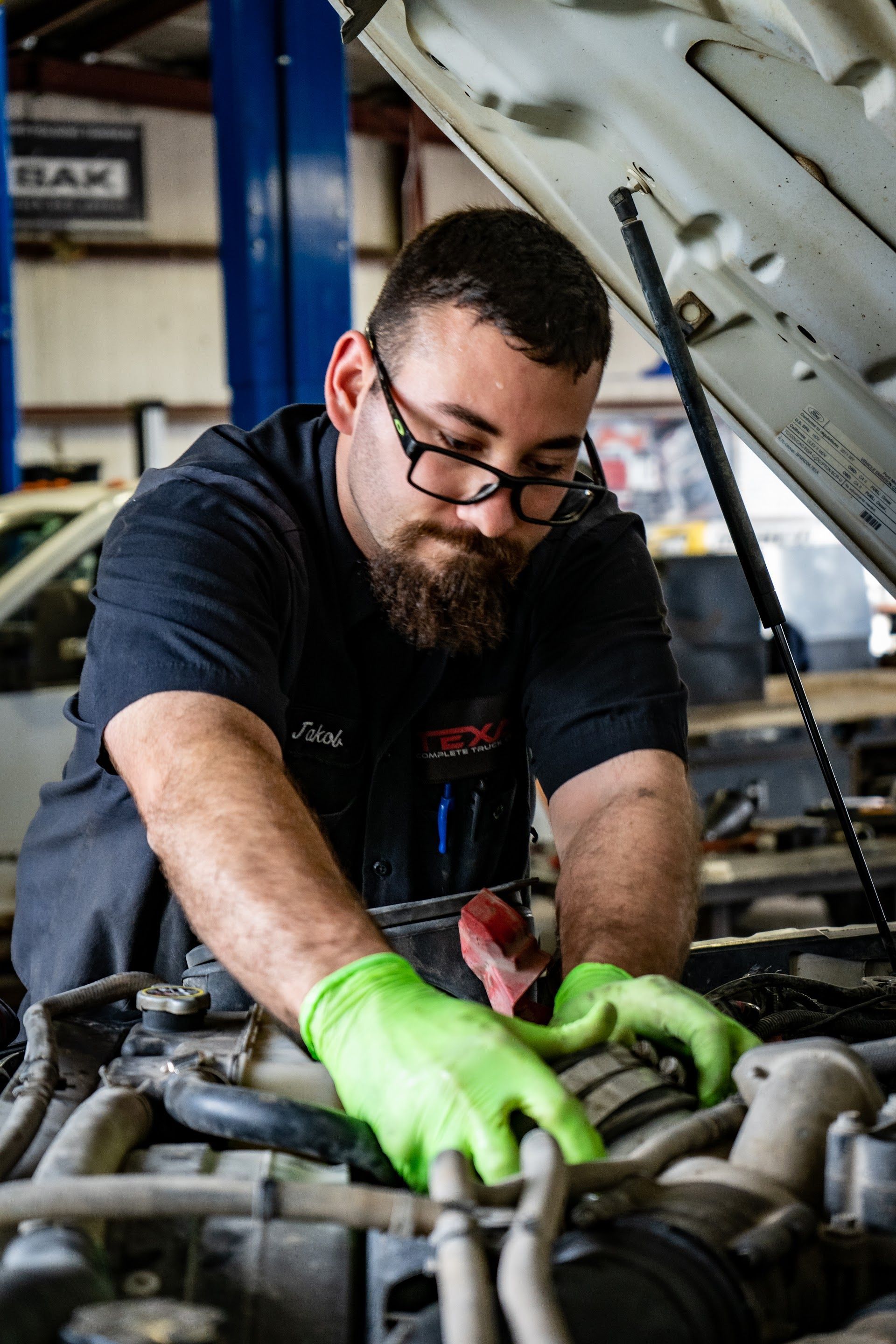 Texas Complete Truck Center Technician Performing Engine Bay Repair | Texas Complete Truck Center